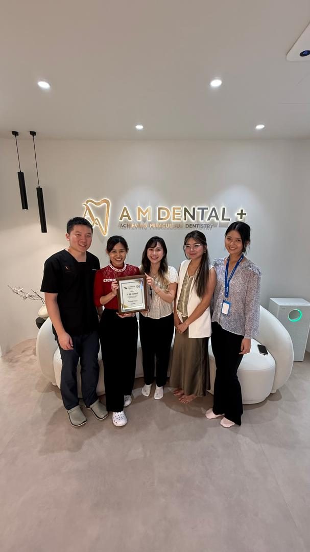 About The A M Dental team with their Angel Aligner Platinum Provider award