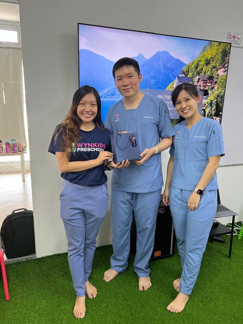 The A M Dental team presenting at a preschool