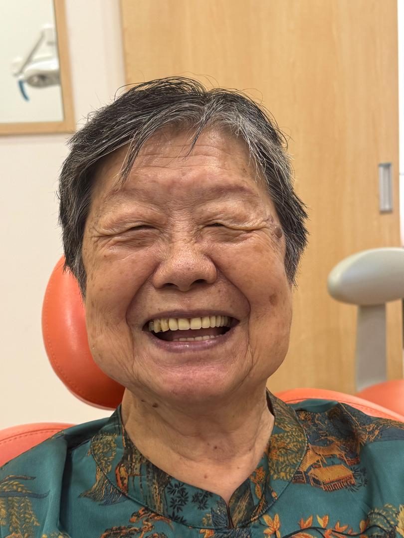Dentures A denture patient smiling at A M Dental