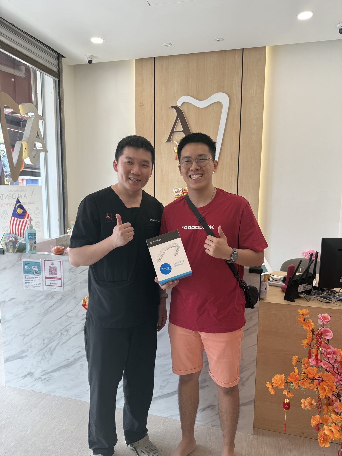 A patient with the A M Dental team